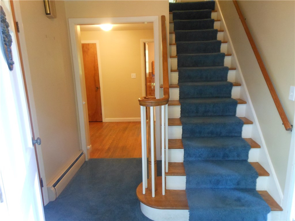 69 Absalona Hill Road Glocester, RI 02814 - Photo 26 of 27 HALLWAY AND STAIRS TO SECOND FLOOR