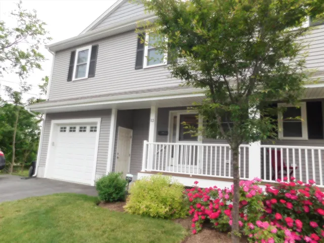 a house with yard and a garden