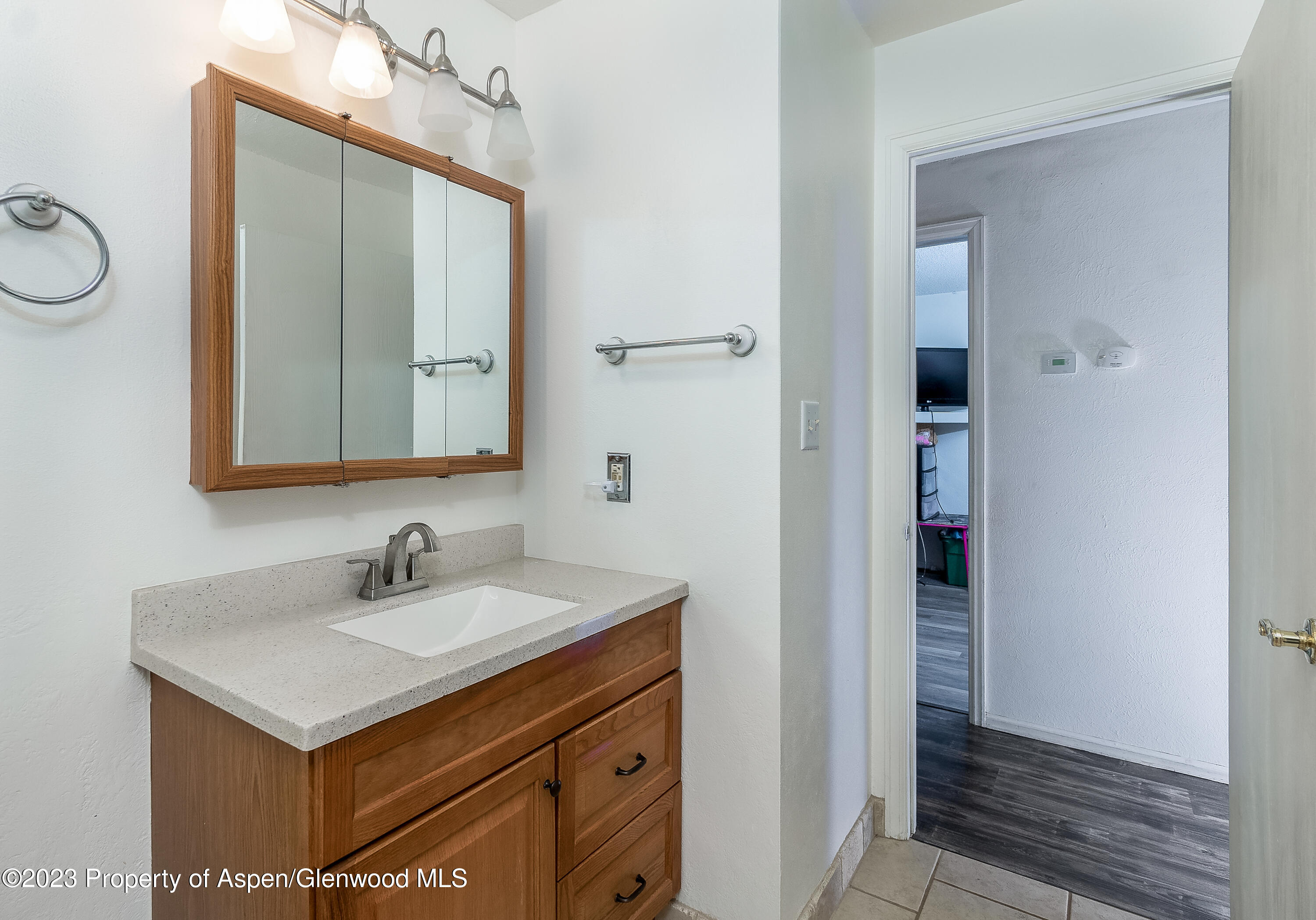 51 Hackberry Lane Parachute, CO 81635 - Photo 12 of 17 a bathroom with a sink and a mirror