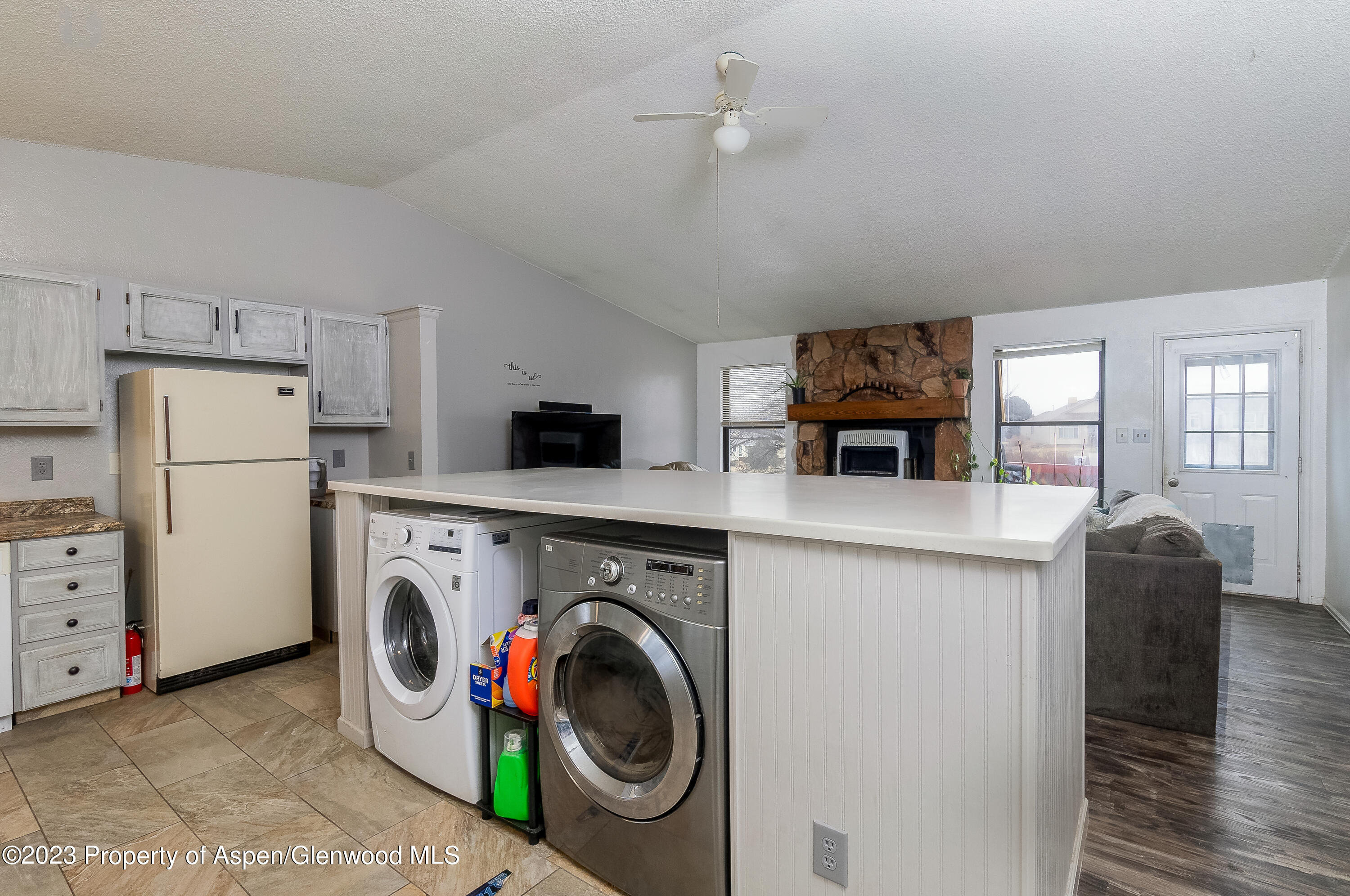 51 Hackberry Lane Parachute, CO 81635 - Photo 7 of 17 a view of kitchen and washer and dryer