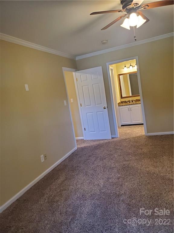 8919 Vicksburg Road Charlotte, NC 28227 - Photo 17 of 22 an empty room with a bathroom