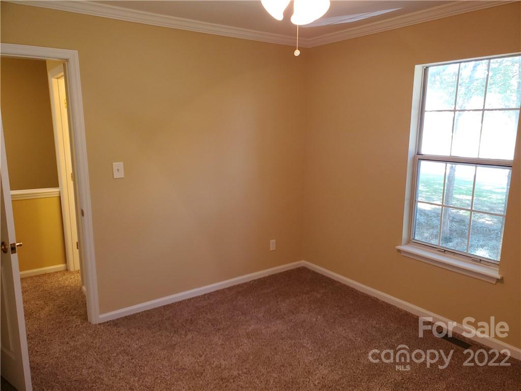 8919 Vicksburg Road Charlotte, NC 28227 - Photo 22 of 22 an empty room with windows