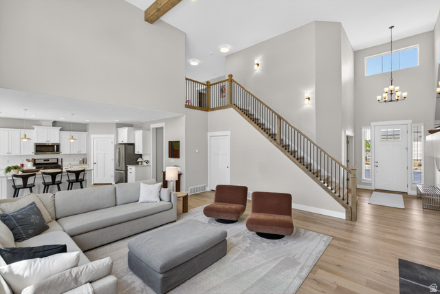 354 North 800 W Street Mapleton, UT 84664 - Photo 40 of 90 Living room with suspended lighting and light wood finished floors