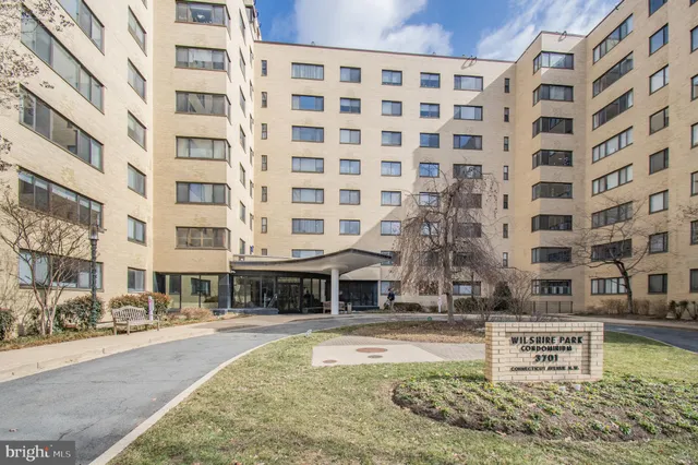 a view of a building with a street