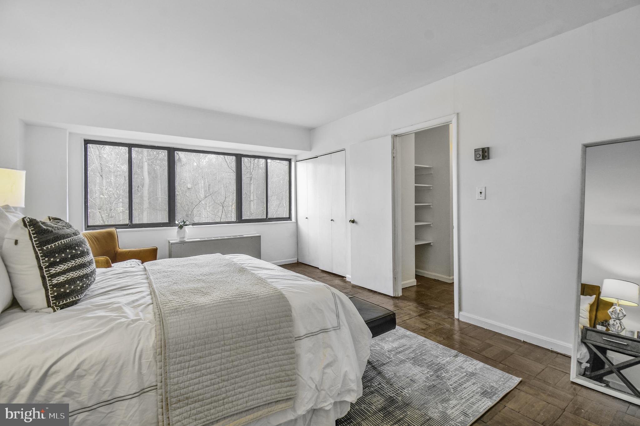 3701 Connecticut Avenue Northwest, Unit 236 Washington, DC 20008 - Photo 15 of 19 a bedroom with a bed and a window