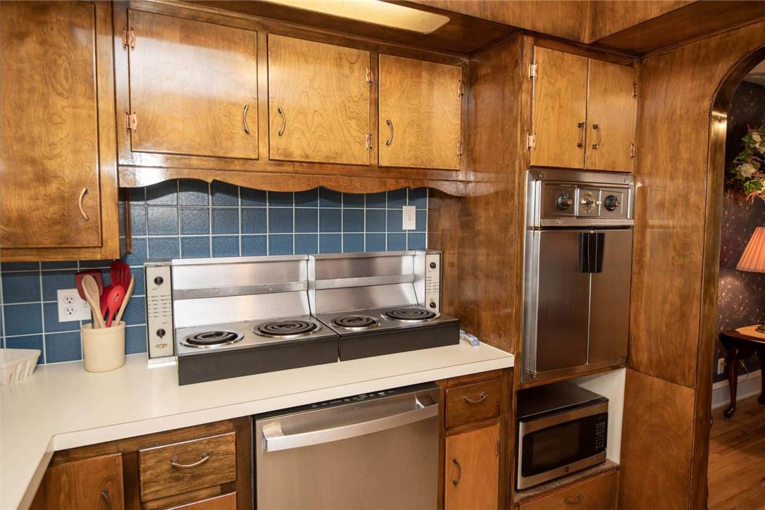706 Stones Crossing Road Easton, PA 18045 - Photo 12 of 40 Look how the stove folds down for cooking and space efficiency