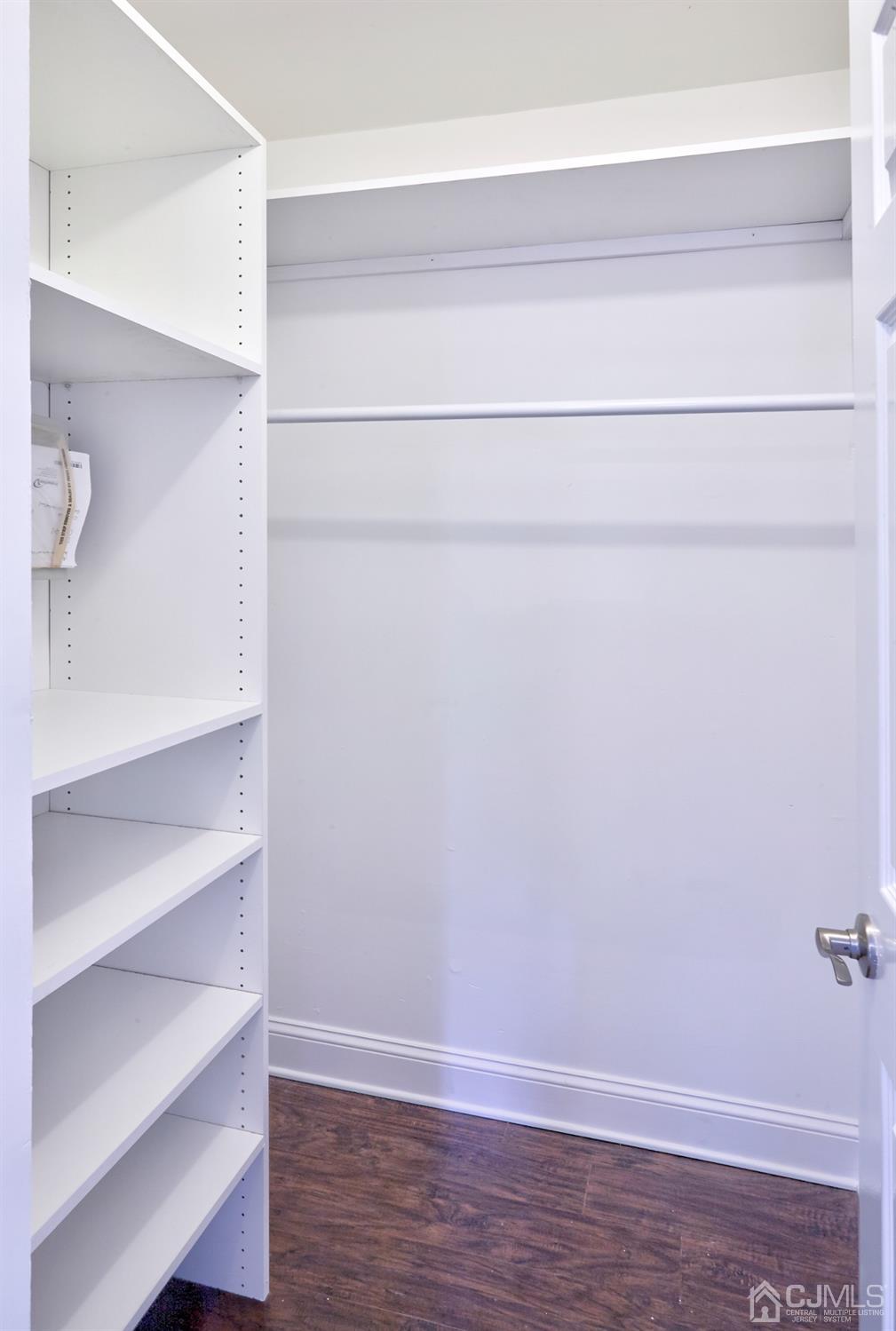 5 Cottingham Drive Monroe Township, NJ 08831 - Photo 19 of 19 a view of an empty walk in closet