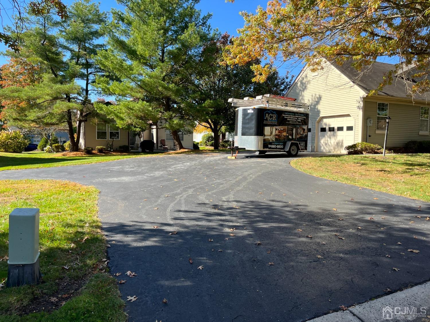 5 Cottingham Drive Monroe Township, NJ 08831 - Photo 6 of 19 a view of a house with a patio