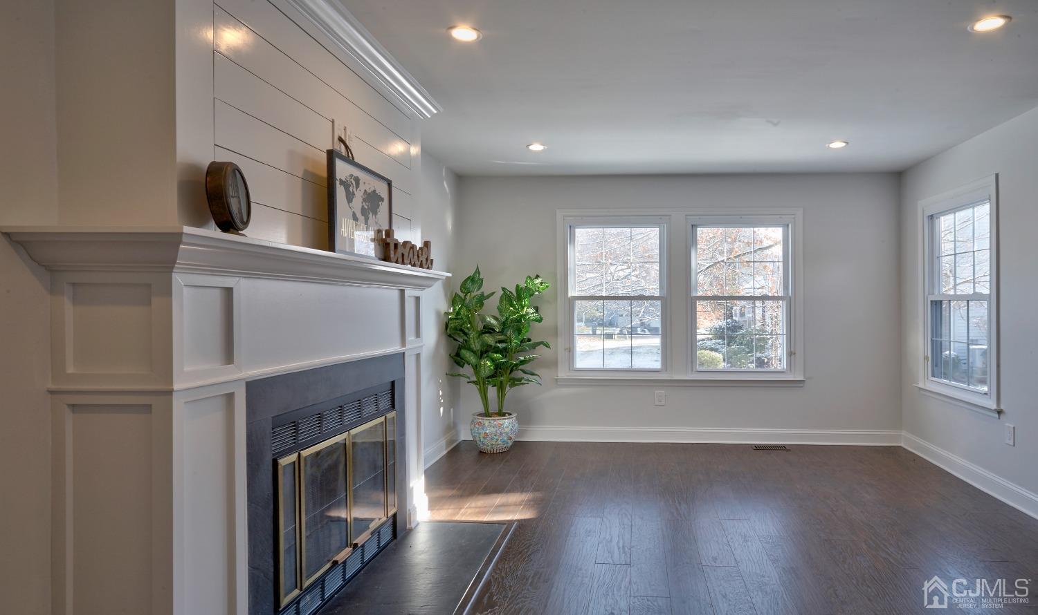 5 Cottingham Drive Monroe Township, NJ 08831 - Photo 8 of 19 a living room with furniture and a fireplace