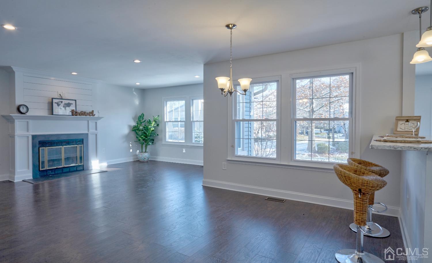 5 Cottingham Drive Monroe Township, NJ 08831 - Photo 9 of 19 a view of livingroom with furniture window and wooden floor