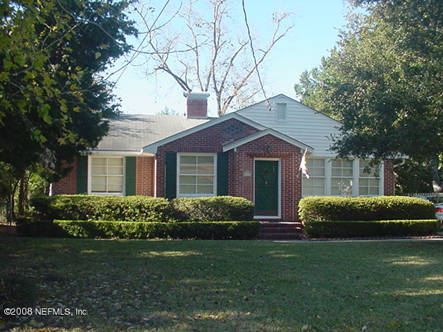 4144 London Road Jacksonville, FL 32207 - Photo 1 of 15 a front view of a house with a garden