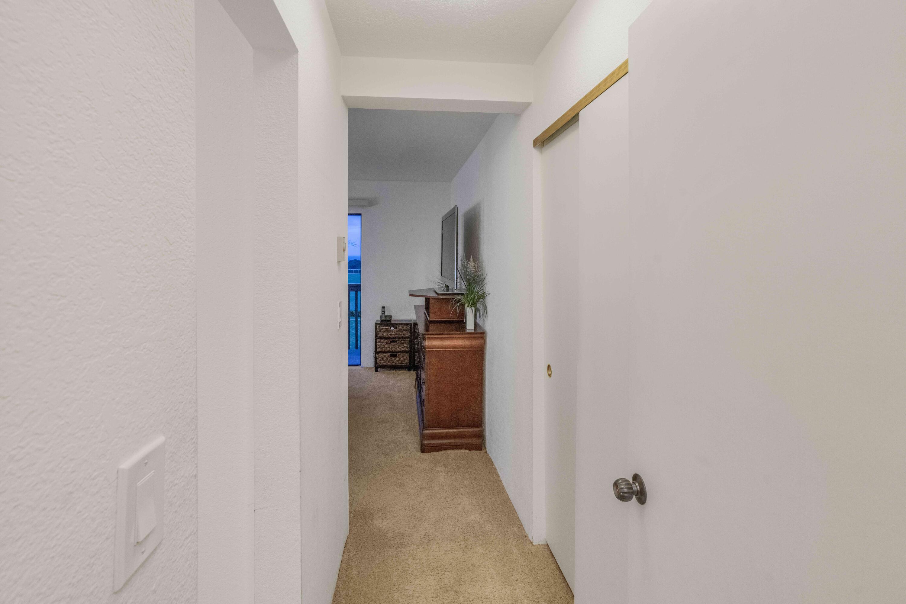 3375 Foothill Road, Unit 1132 Carpinteria, CA 93013 - Photo 23 of 41 Hallway to Primary Bed