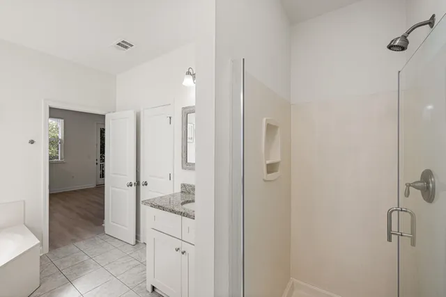 a view of a kitchen with a sink and dishwasher