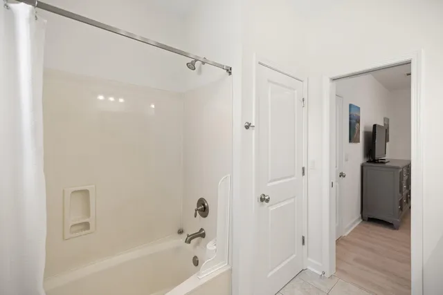 an aerial view of a swimming pool patio swimming pool and outdoor seating