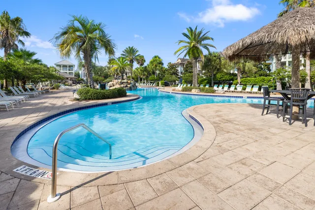 front view of a house with a tree