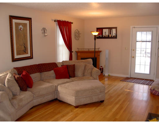98 Coffey Hill Road Ware, MA 01082 - Photo 2 of 9 a living room with furniture and a wooden floor