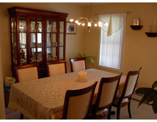98 Coffey Hill Road Ware, MA 01082 - Photo 3 of 9 a dining room with furniture and chandelier