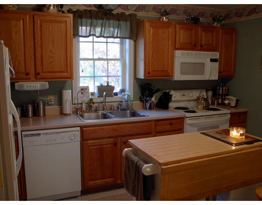 98 Coffey Hill Road Ware, MA 01082 - Photo 4 of 9 a kitchen with a sink cabinets and window