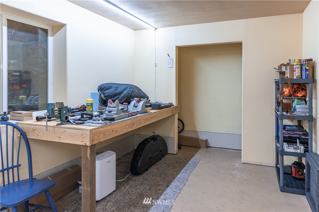 345 Seylor Valley Road Inchelium, WA 99138 - Photo 22 of 28 a room with storage and utility