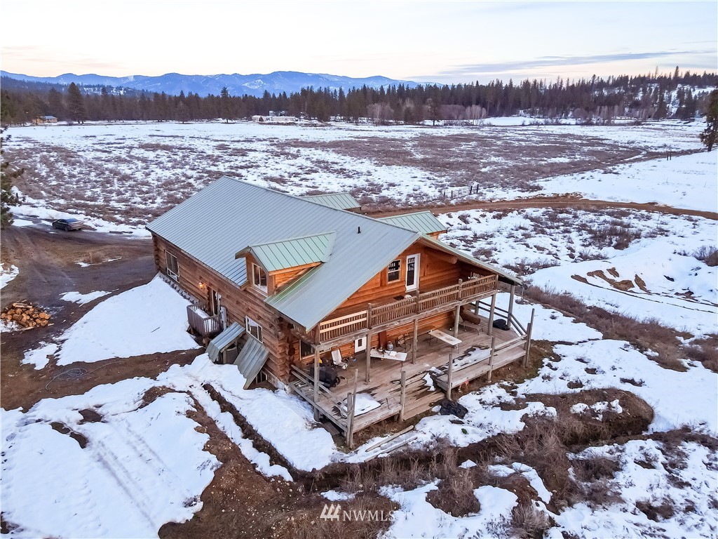 345 Seylor Valley Road Inchelium, WA 99138 - Photo 27 of 28 an aerial view of residential houses with outdoor space