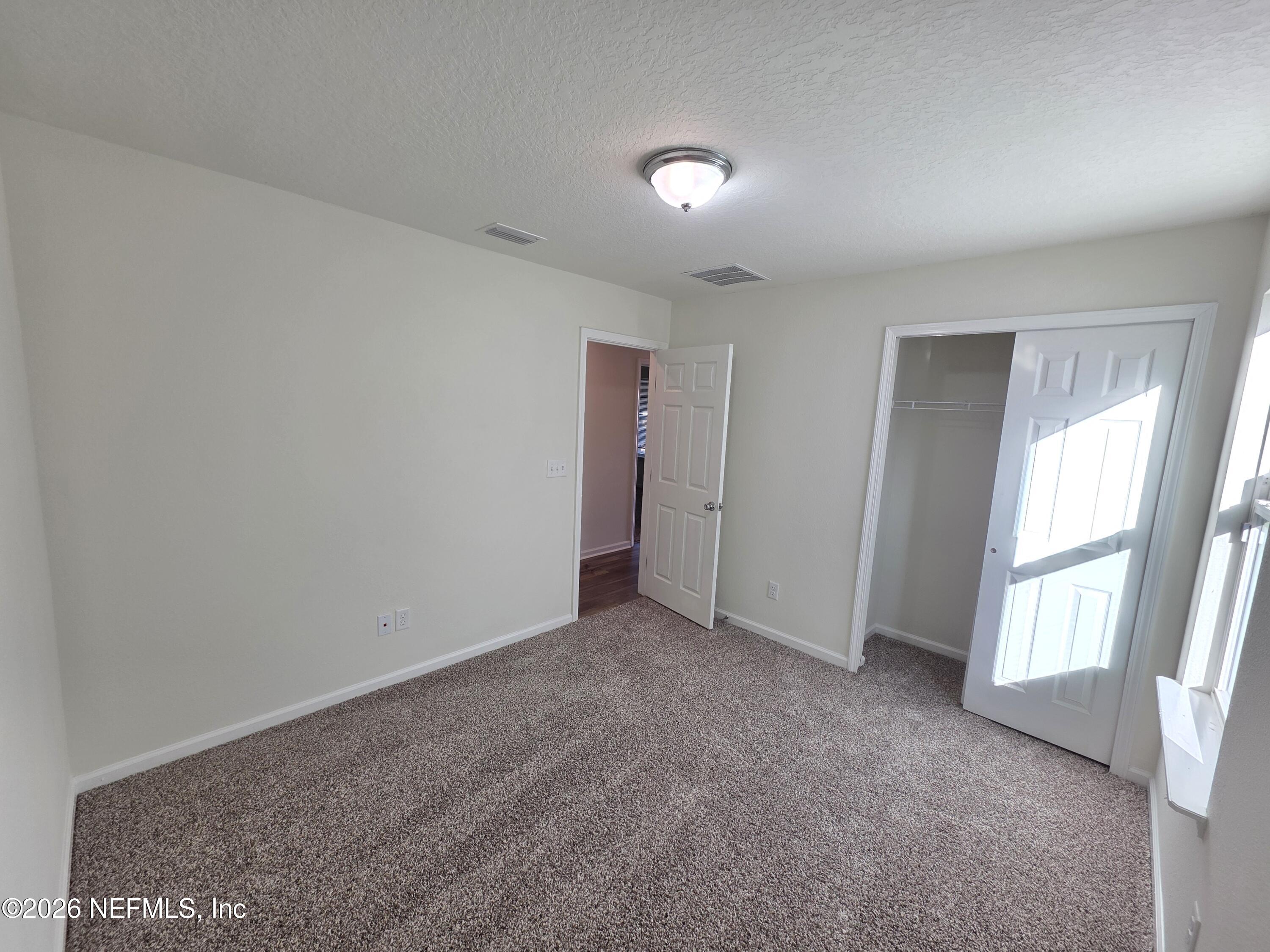 3035 Lucille Lane Middleburg, FL 32068 - Photo 20 of 39 a view of an empty room with a window