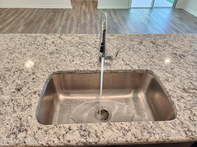 a utility room with a sink