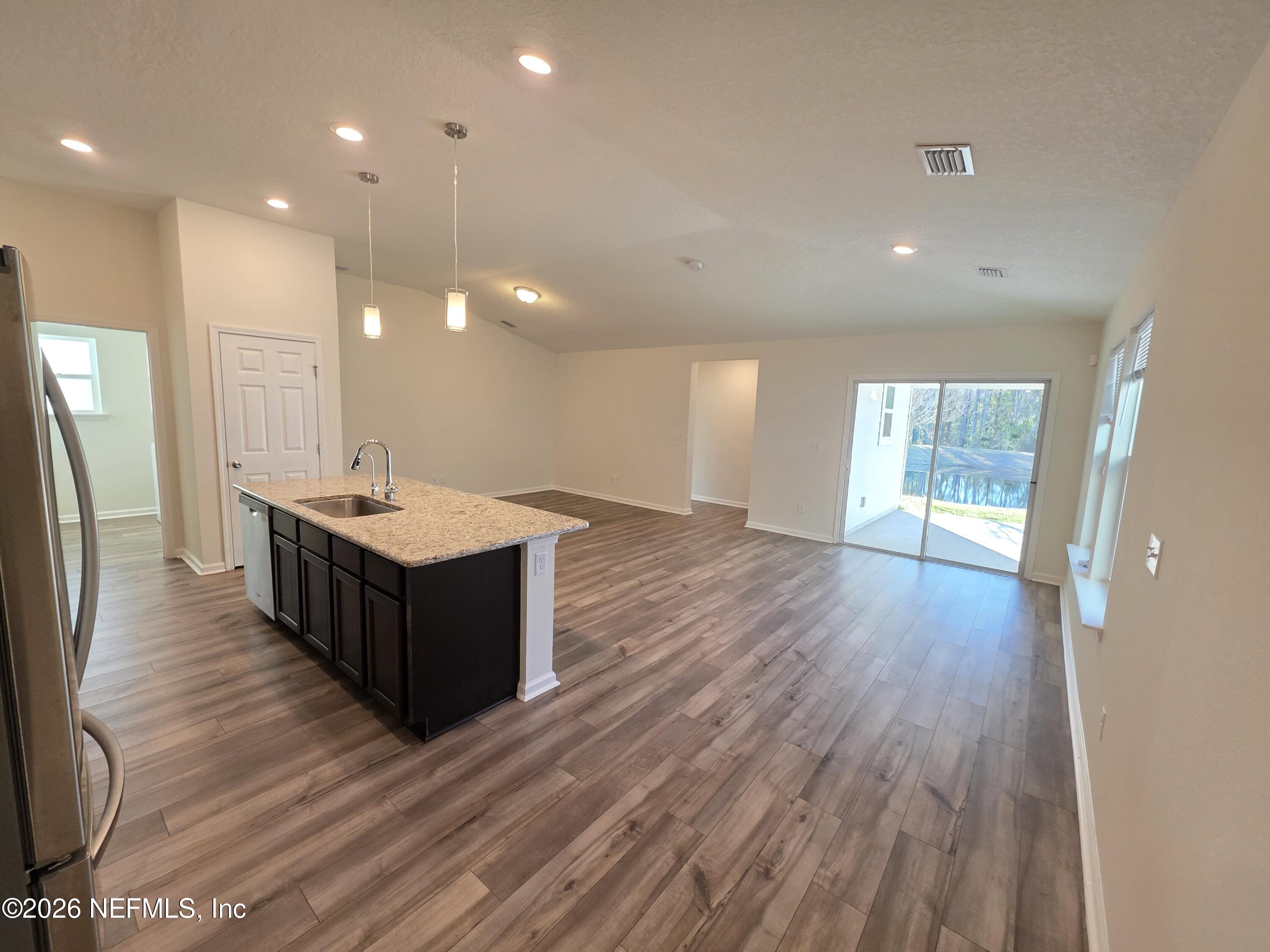 3035 Lucille Lane Middleburg, FL 32068 - Photo 7 of 39 a bathroom with a double vanity sink and a mirror