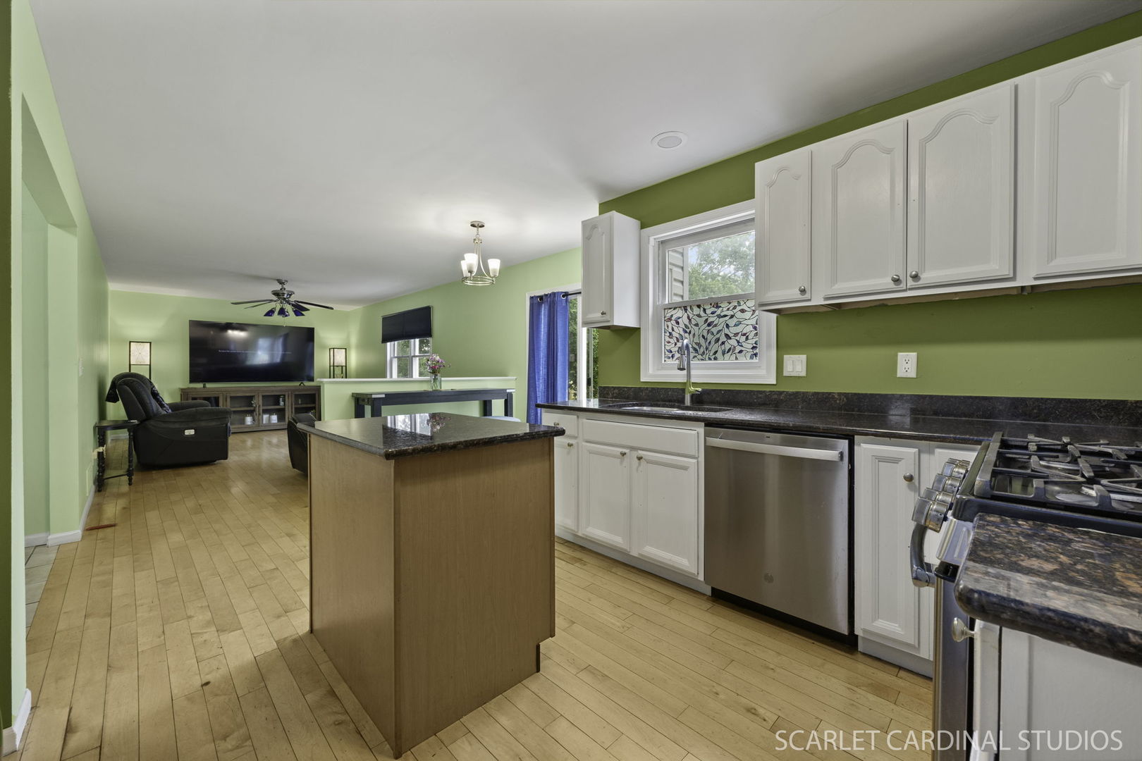3100 Compton Road Aurora, IL 60504 - Photo 12 of 27 a kitchen with stainless steel appliances granite countertop a stove top oven a sink dishwasher and cabinets with wooden floor