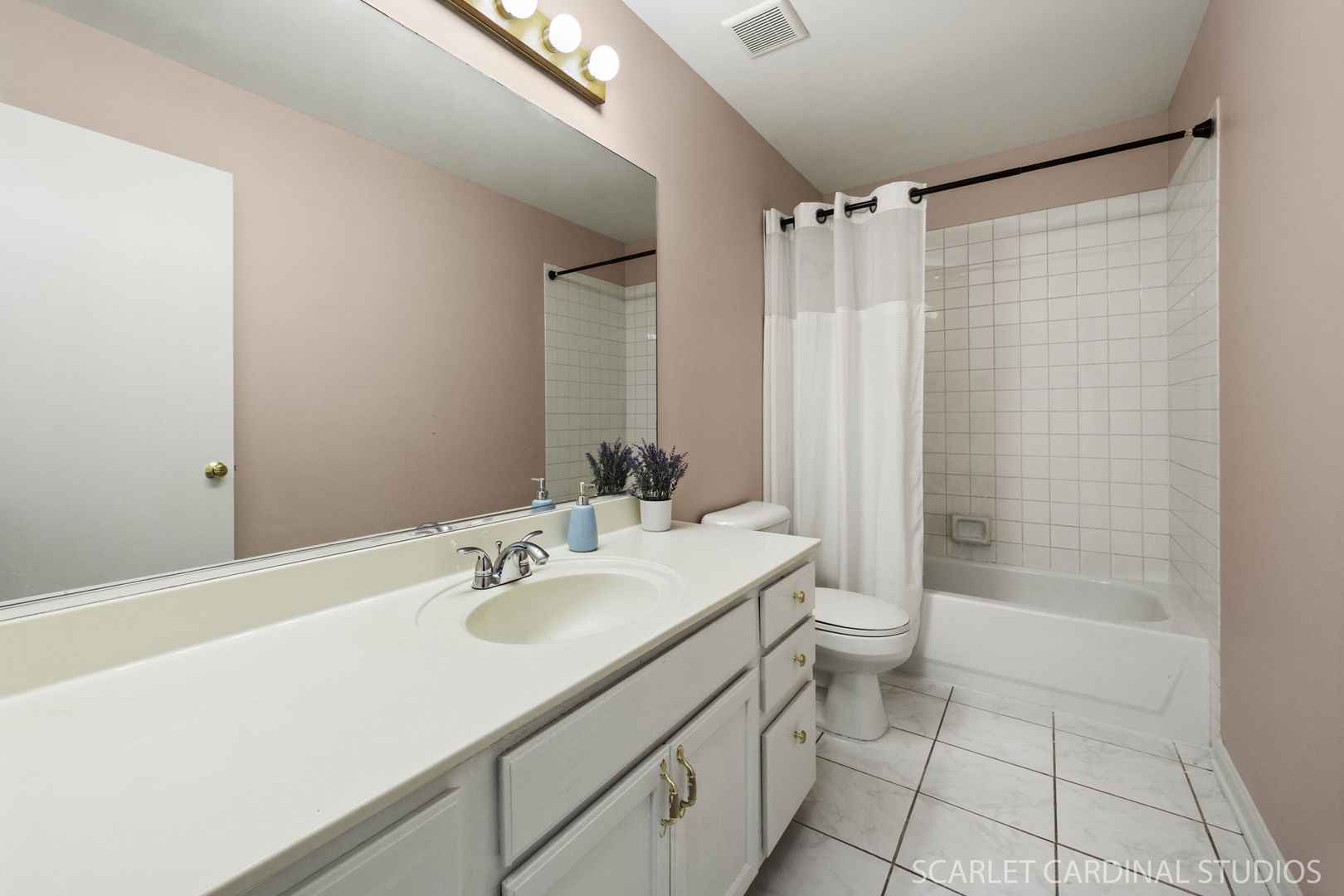 3100 Compton Road Aurora, IL 60504 - Photo 17 of 27 a bathroom with a sink a toilet and shower