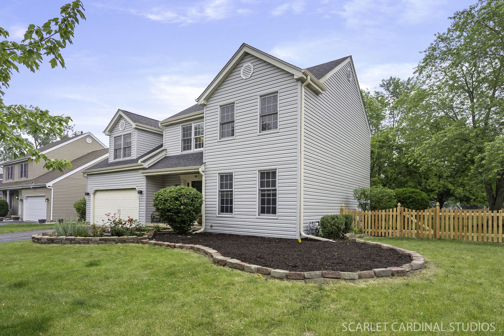 3100 Compton Road Aurora, IL 60504 - Photo 2 of 27 a front view of a house with a yard and garage