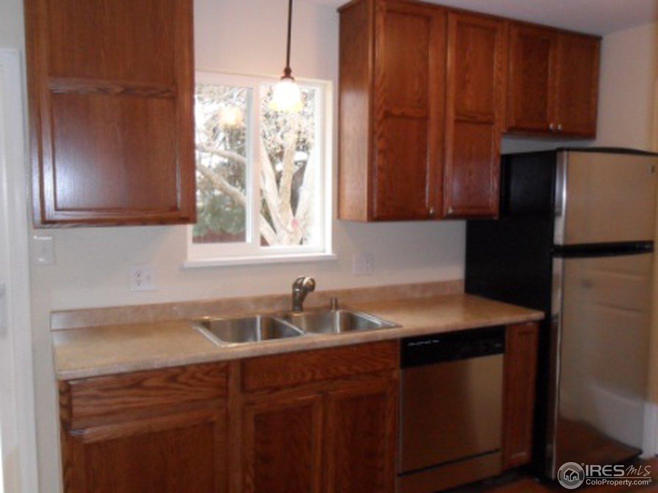 2808 Redwing Road Fort Collins, CO 80526 - Photo 6 of 18 42" cabinets and brand new appliances
