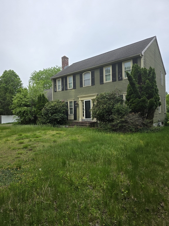 4 Canoe River Road Easton, MA 02375 - Photo 8 of 9 a front view of a house with a yard