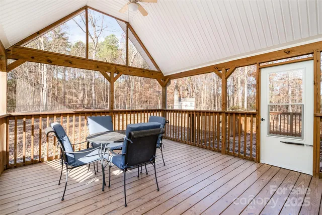 a view of a brick house with a large window
