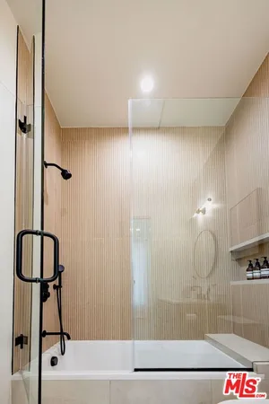 a view of balcony with two chairs