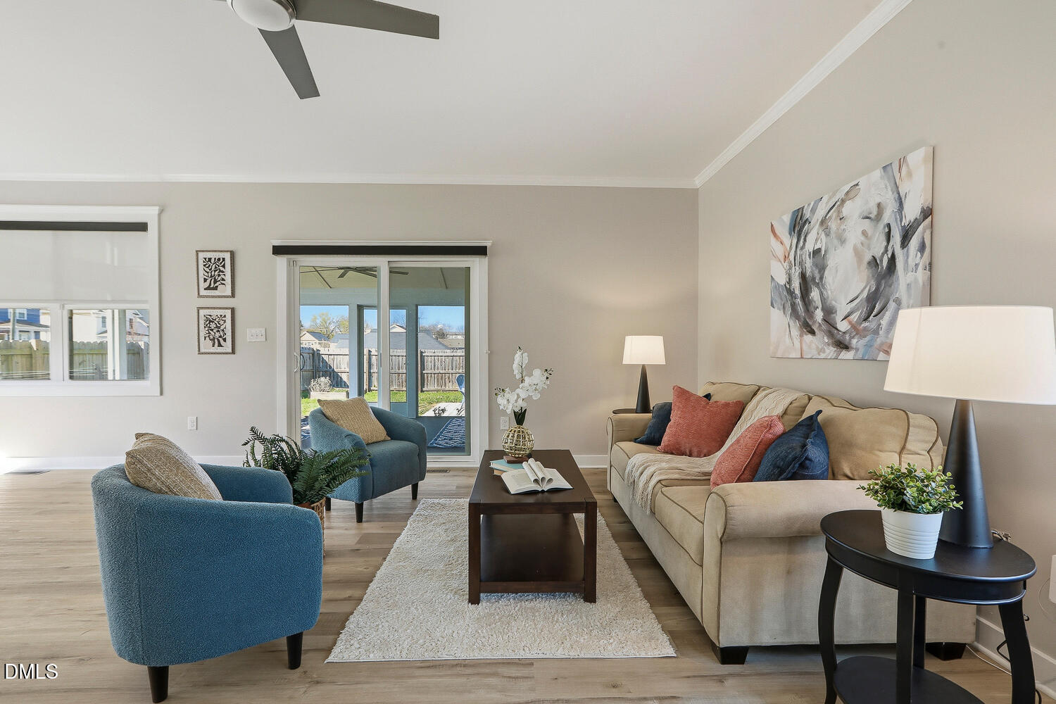 1605 Boyer Street Raleigh, NC 27610 - Photo 6 of 38 a living room with furniture and a large window