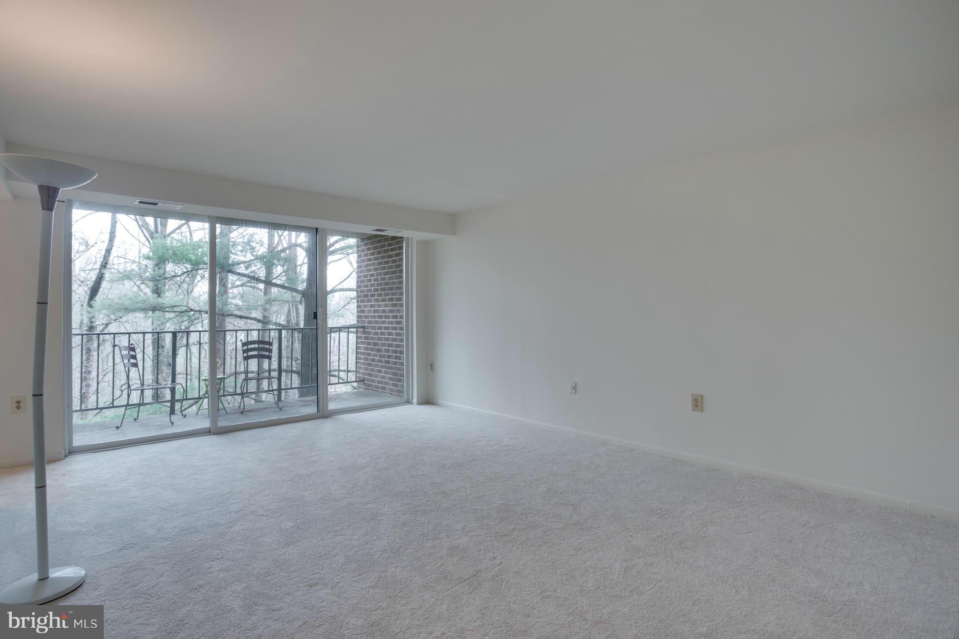 1552 Northgate Square, Unit 22B Reston, VA 20190 - Photo 3 of 21 Living Room to Balcony
