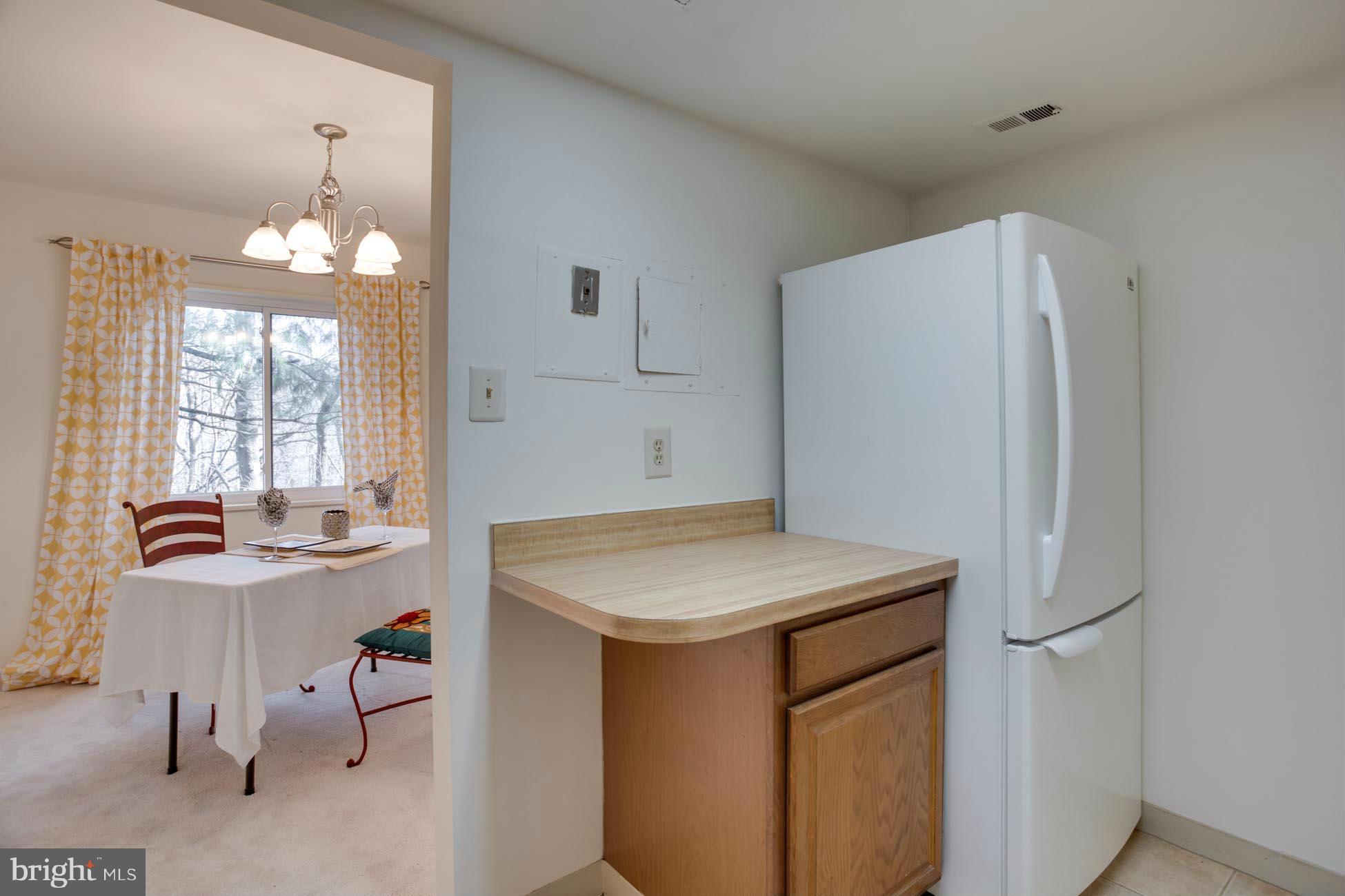 1552 Northgate Square, Unit 22B Reston, VA 20190 - Photo 7 of 21 Kitchen to Dining Room