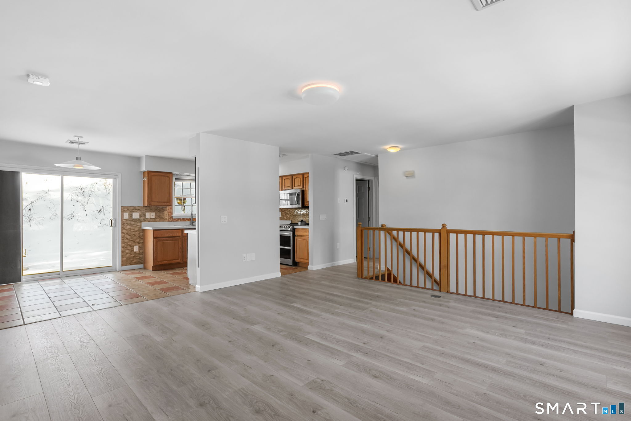 19 Candlewood Springs Road New Milford, CT 06776 - Photo 16 of 40 a view of a kitchen with wooden floor and a kitchen