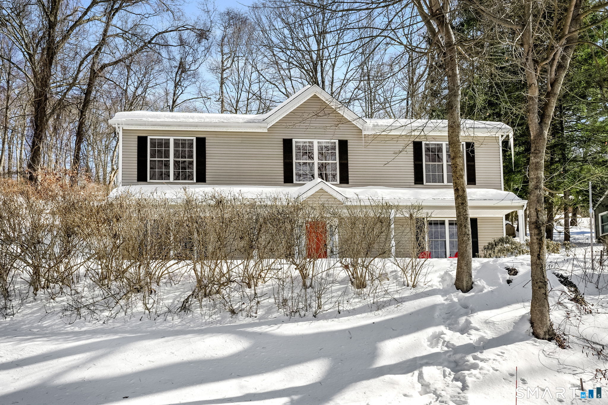 19 Candlewood Springs Road New Milford, CT 06776 - Photo 2 of 40 a view of a house with a yard covered in snow