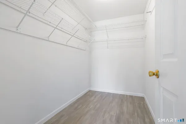 a view of a room with racks on the wall