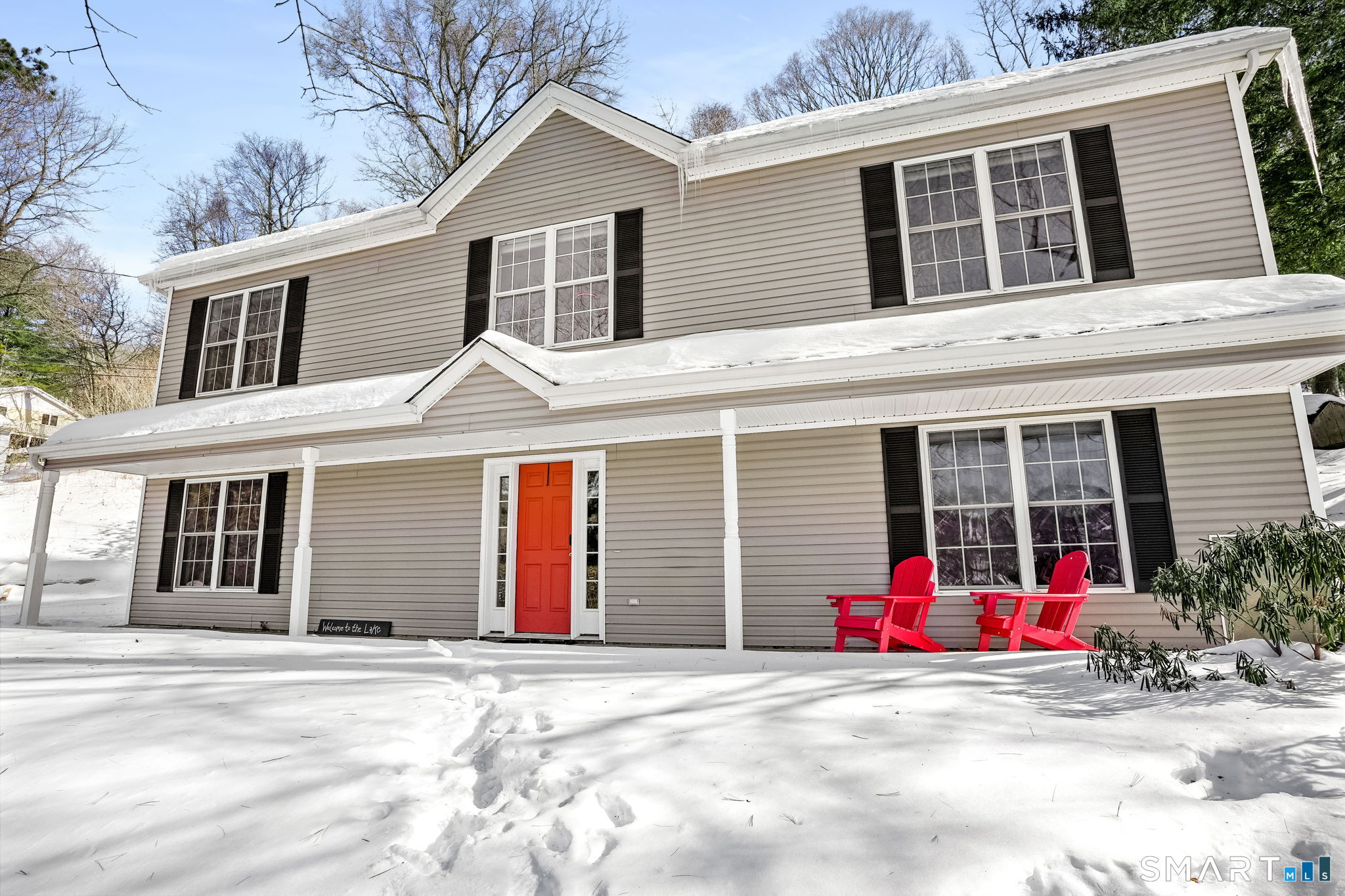 19 Candlewood Springs Road New Milford, CT 06776 - Photo 3 of 40 a view of a house with a patio and a yard