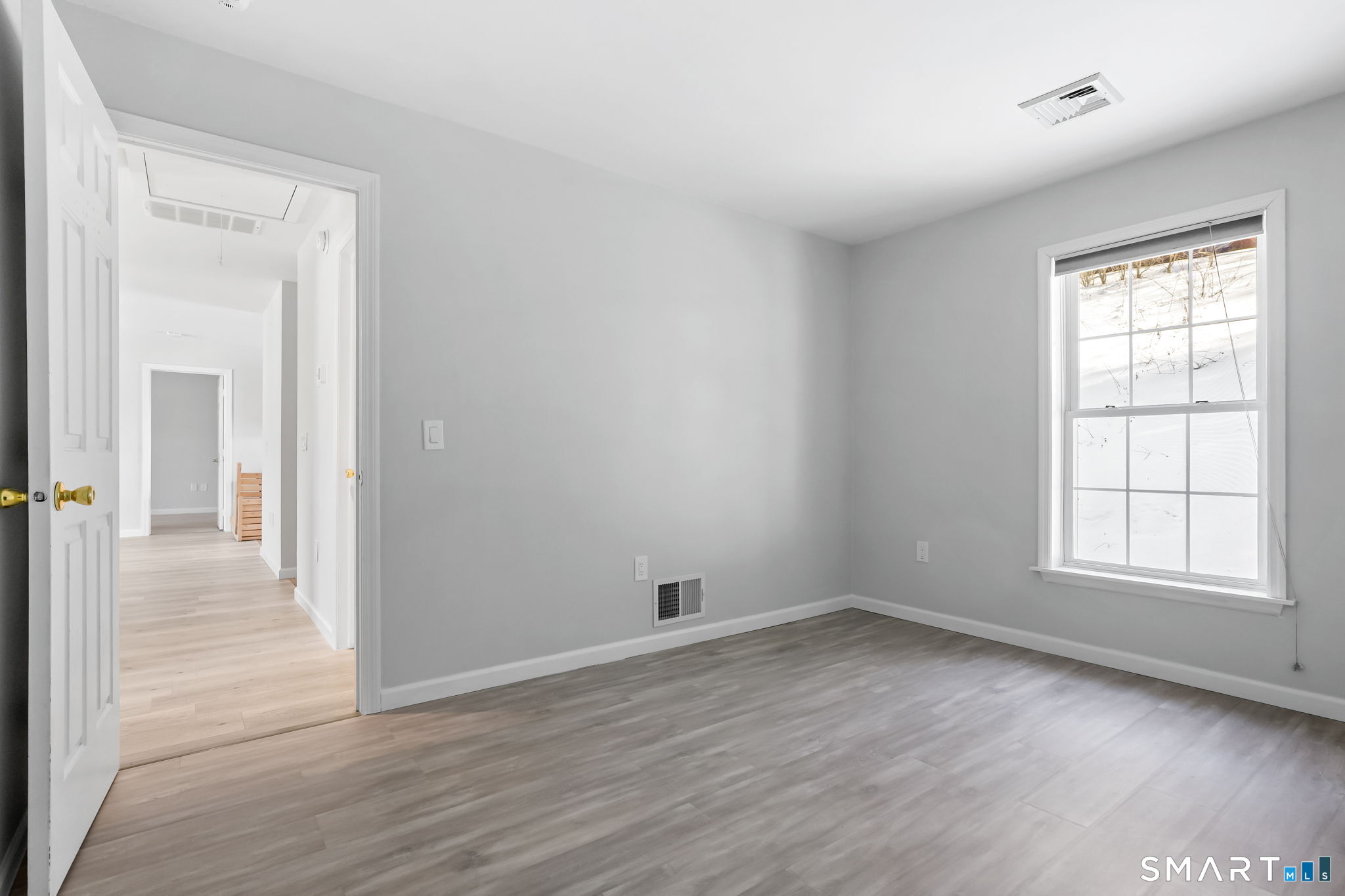 19 Candlewood Springs Road New Milford, CT 06776 - Photo 34 of 40 an empty room with wooden floor and windows