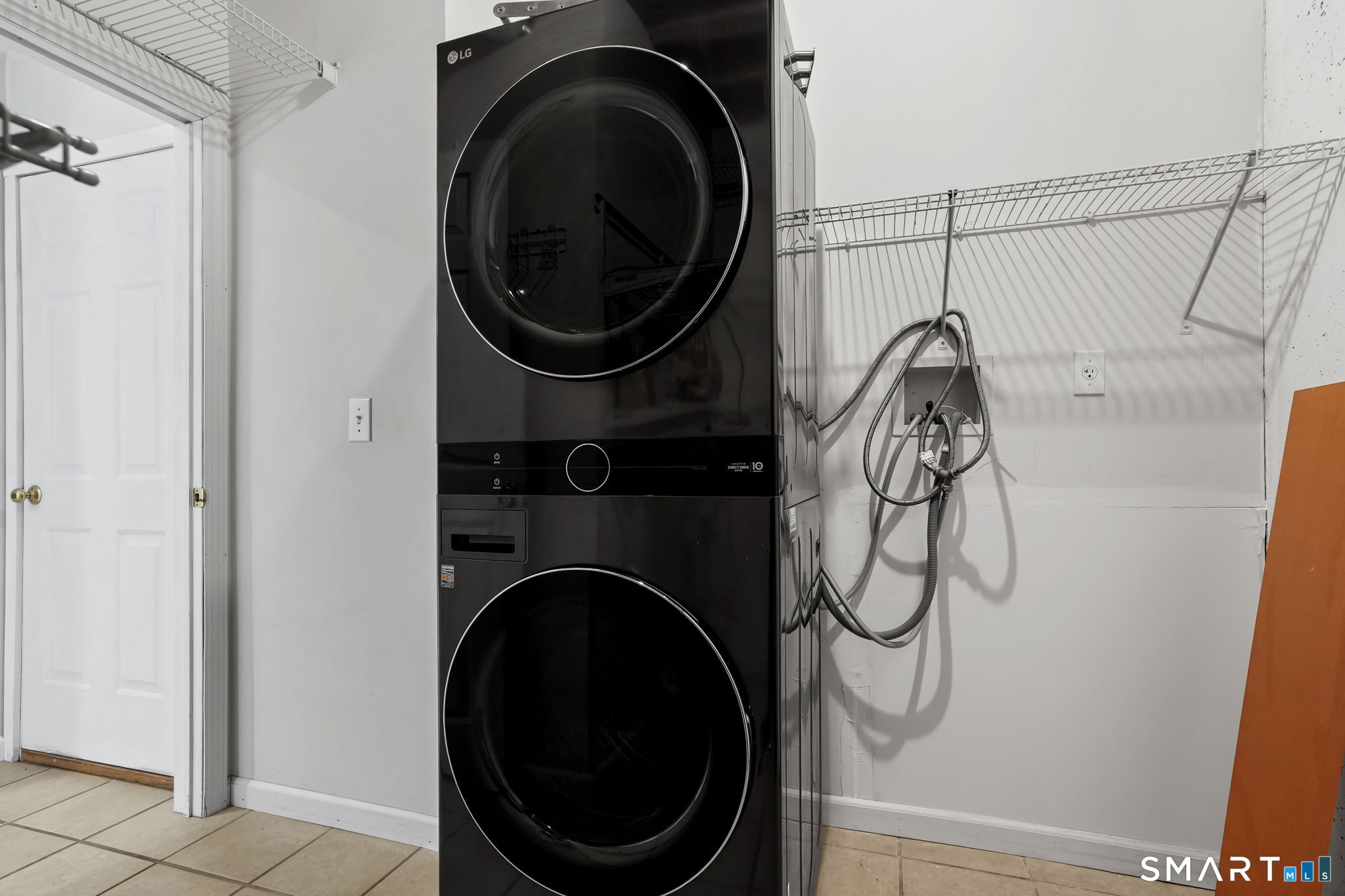 19 Candlewood Springs Road New Milford, CT 06776 - Photo 37 of 40 a close view of a utility room with dryer and washer