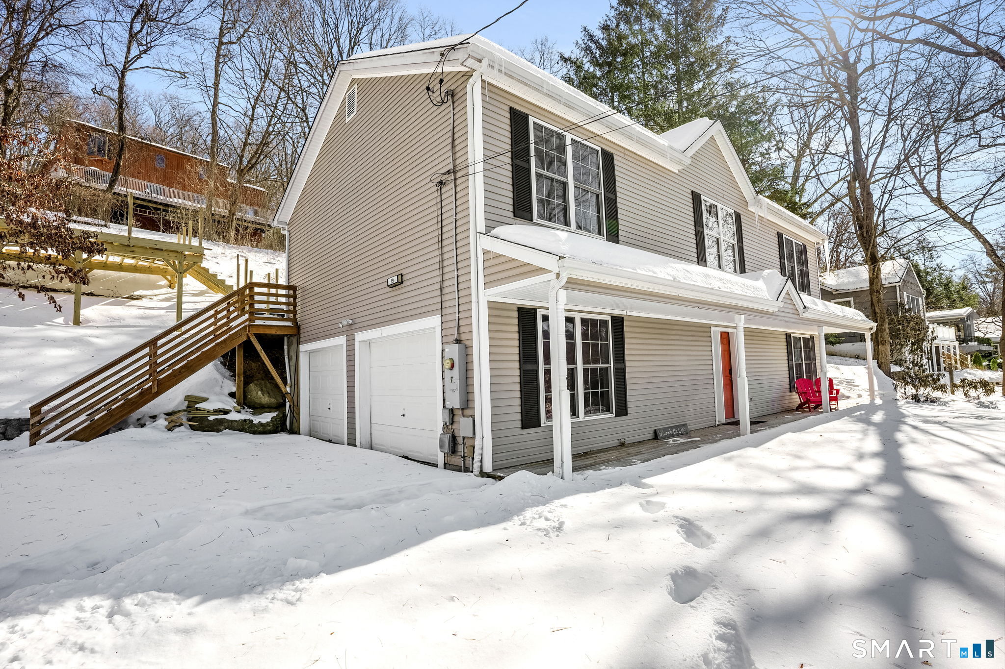 19 Candlewood Springs Road New Milford, CT 06776 - Photo 4 of 40 a view of a house with a snow in the yard