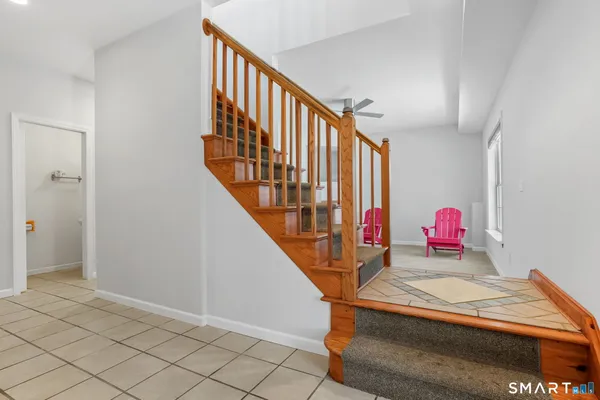 a living room with stairs