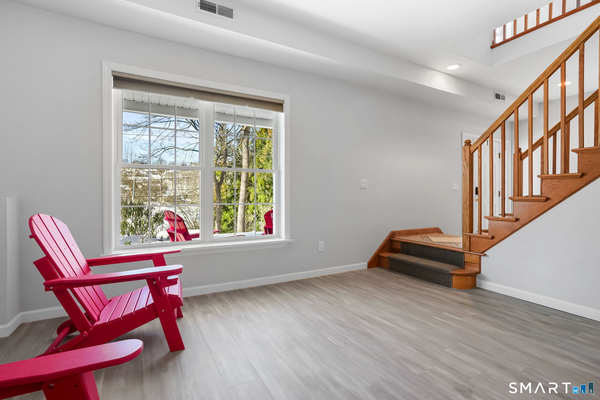 19 Candlewood Springs Road New Milford, CT 06776 - Photo 10 of 40 a workspace with wooden floor a glass table and chair