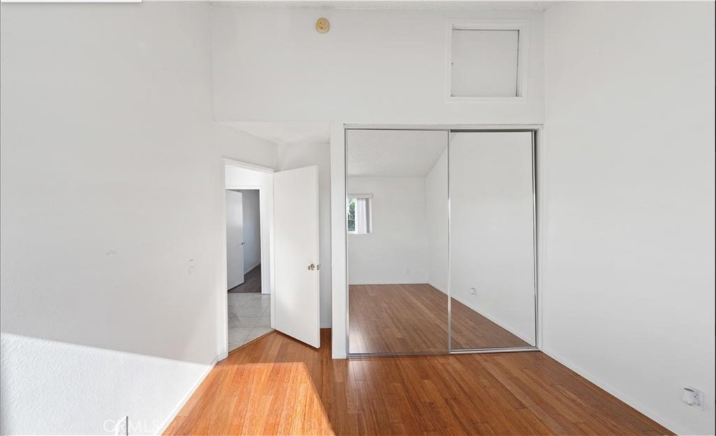 1108 Termino Avenue Long Beach, CA 90804 - Photo 14 of 22 a view of empty room with wooden floor