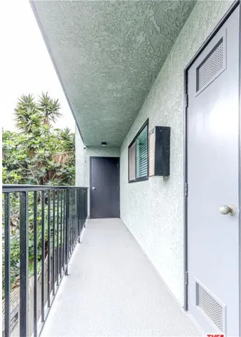 a front view of a house with balcony
