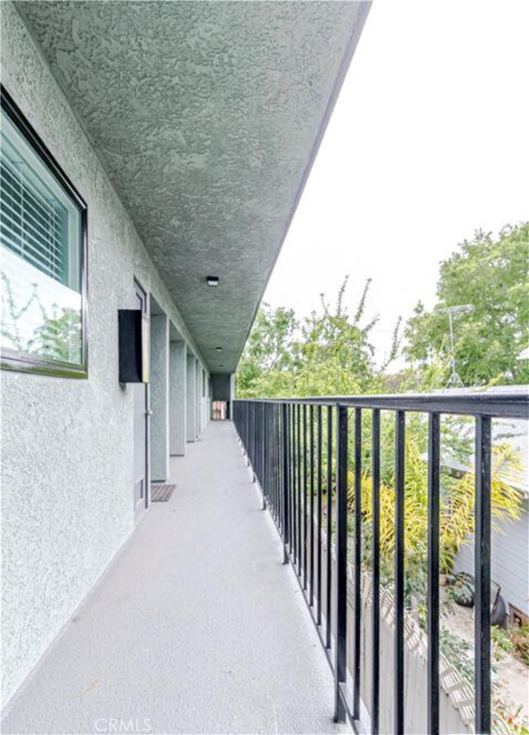 1108 Termino Avenue Long Beach, CA 90804 - Photo 5 of 22 a view of a balcony with wooden floor and outdoor space