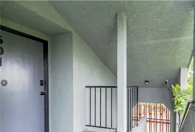 a view of a balcony with an outdoor space